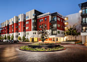 Thumbnail 9 of 42 - A modern building with a courtyard in the center. at Sorrel at Warner Center, Woodland Hills