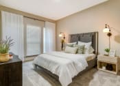 Thumbnail 8 of 30 - a bedroom with a bed and a window at Summerwind, Texas