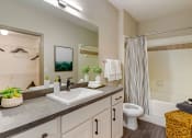 Thumbnail 10 of 30 - a bathroom with a sink and a toilet and a shower at Summerwind, Texas, 77584