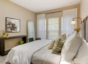 Thumbnail 9 of 30 - a bedroom with a large bed and a window at Summerwind, Pearland, 77584