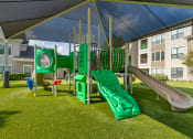 Thumbnail 25 of 30 - a playground with slides and a tent at Summerwind, Texas