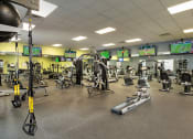 Thumbnail 23 of 29 - a gym with a lot of weights and cardio equipment at Veranda at Centerfield, Houston, Texas