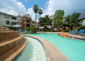 Thumbnail 19 of 29 - a large swimming pool with buildings in the background at Veranda at Centerfield, Houston