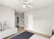 Thumbnail 7 of 29 - a bedroom with a bed and a ceiling fan at Veranda at Centerfield, Houston, 77070