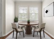Thumbnail 10 of 28 - a dining room with a table and chairs and a window at Villages of Cypress Creek, Houston, 77070