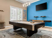 Thumbnail 20 of 28 - a game room with a pool table and a tv at Villages of Cypress Creek, Houston, Texas