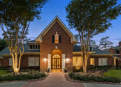 Thumbnail 27 of 28 - the front of a brick house with a walkway and trees at Villages of Cypress Creek, Texas, 77070