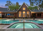 Thumbnail 15 of 28 - a house with a swimming pool in front of it at Villages of Cypress Creek, Houston, Texas
