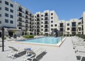 Thumbnail 20 of 22 - resort style swimming pool | District West Gables Apartments in West Miami, Florida