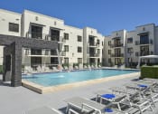 Thumbnail 19 of 22 - resort style swimming pool | District West Gables Apartments in West Miami, Florida