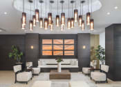 Thumbnail 8 of 22 - clubhouse and lounge area | District West Gables Apartments in West Miami, Florida
