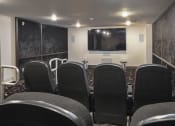 Thumbnail 14 of 22 - movie lounge | District West Gables Apartments in West Miami, Florida