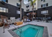 Thumbnail 7 of 30 - Newly Designed & Renovated Pool Deck with Swimming Pool, Hot Tub, Cabanas PLUS Grilling & Dining Area  at Duet on Wilcox, Los Angeles
