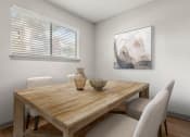 Thumbnail 19 of 31 - a dining room with a table and chairs at South Lamar Village, Austin, TX, 78704