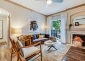 Thumbnail 1 of 35 - a living room with furniture and a fireplace