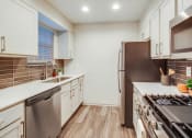 Thumbnail 4 of 35 - Kitchen with sink