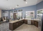 Thumbnail 24 of 29 - a large kitchen with a sink and a refrigerator at Veranda at Centerfield, Houston