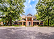 Thumbnail 38 of 38 - Two story brick office building with parking lot at Wyndchase Aspen Grove Apartments, Franklin, 37067
