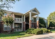 Thumbnail 33 of 38 - Two story apartment building with covered balconies at Wyndchase Aspen Grove Apartments, Franklin, 37067