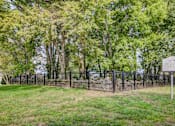 Thumbnail 29 of 38 - Historic cemetery with fencing and memorial marker at Wyndchase Aspen Grove Apartments, Tennessee, 37067