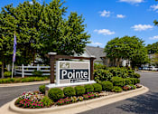 Thumbnail 1 of 33 - A sign that says "The Pointe at Wimbledon" in front of a building.