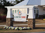 Thumbnail 14 of 14 - A sign for Ellington Farms in front of a house.