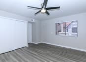 Thumbnail 15 of 17 - the living room of our studio apartment atrium with a ceiling fan at Tides at Mesa, Mesa