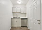 Thumbnail 25 of 54 - Small kitchen with dishwasher at Connect on University, Mesa