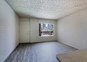 Thumbnail 8 of 19 - Room with Window and Wooden Floor at Ambassador West Apartments, Phoenix, AZ, 85003