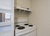 Thumbnail 7 of 19 - White Stove at Ambassador West Apartments, Arizona, 85003
