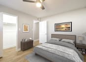 Thumbnail 4 of 10 - a bedroom with a bed and a ceiling fan