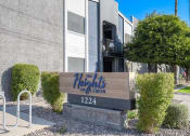 Thumbnail 6 of 10 - a building with a sign that reads the heights on bloom