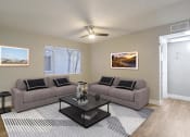 Thumbnail 3 of 10 - a living room with some chairs and a carpet