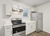 Thumbnail 3 of 54 - Kitchen with cabinets at Connect on University, Mesa, Arizona