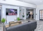 Thumbnail 2 of 17 - a living room with a couch and a tv at Tides at Mesa, Mesa