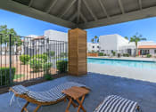 Thumbnail 5 of 17 - our apartments have a large pool and lounge chairs at Tides at Mesa, Mesa