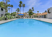 Thumbnail 23 of 28 - a swimming pool with palm trees in the background at Tides on McDowell, Arizona, 85035