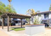 Thumbnail 12 of 12 - a pergola in front of a building