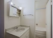 Thumbnail 11 of 19 - Bathroom with Sink at Ambassador West Apartments, Arizona