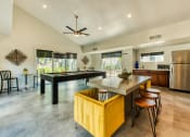 Thumbnail 6 of 13 - a large kitchen with a large island and a pool table at Connect on Northern, Glendale, AZ 85301