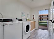 Thumbnail 21 of 21 - Laundry Room at Windrose Villas Apartments, Arizona, 85029