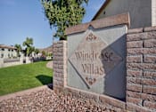 Thumbnail 16 of 21 - Property sign at Windrose Villas Apartments, Phoenix, AZ