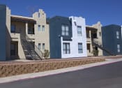 Thumbnail 19 of 21 - a row of apartment buildings on a street
