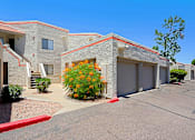 Thumbnail 85 of 94 - A row of houses with a red curb in front.