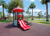 Thumbnail 9 of 21 - a playground with a red slide and monkey bars
