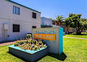 Thumbnail 21 of 30 - Property Sign at The Link Apartments, Mesa, Arizona
