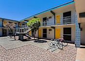 Thumbnail 25 of 30 - Bicycle parked on a gravel at The Link Apartments, Mesa, AZ, 85201