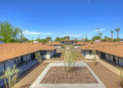 Thumbnail 9 of 13 - a view of the community from the roof of a building