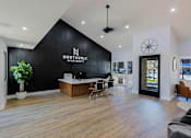 Thumbnail 32 of 44 - A reception area for the Northernly Apartments with a black and white color scheme.