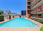 Thumbnail 17 of 19 - Large Swimming Pool at Ambassador West Apartments, Arizona, 85003